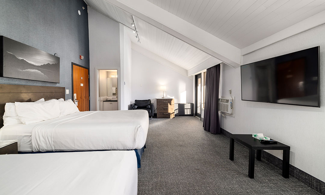 Superior hotel room with two queen beds